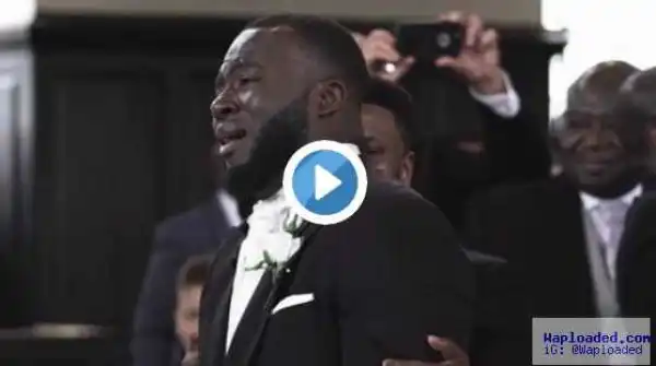 Romantic? Heartmelting moment groom weeps like a baby as he watches bride walk up the aisle